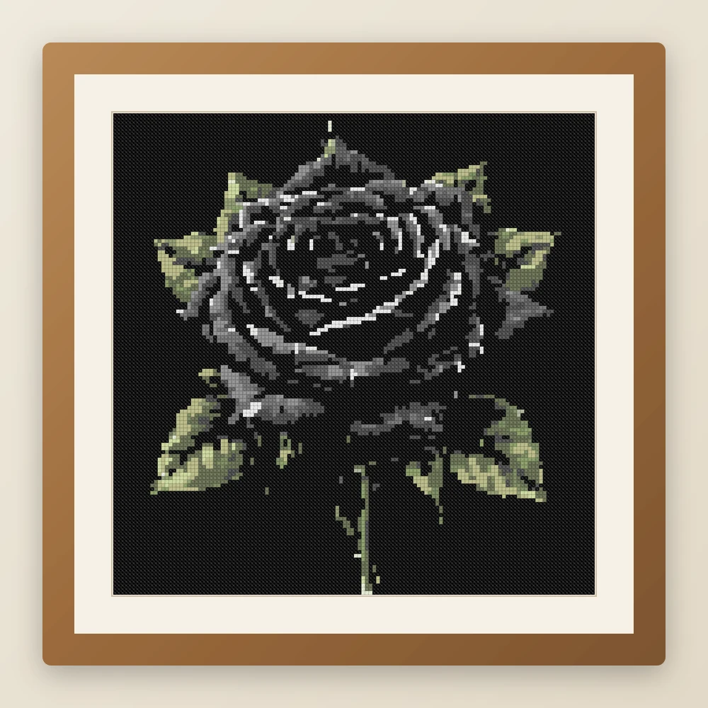 Black Rose Thorns cross stitch pattern, example of a finished piece