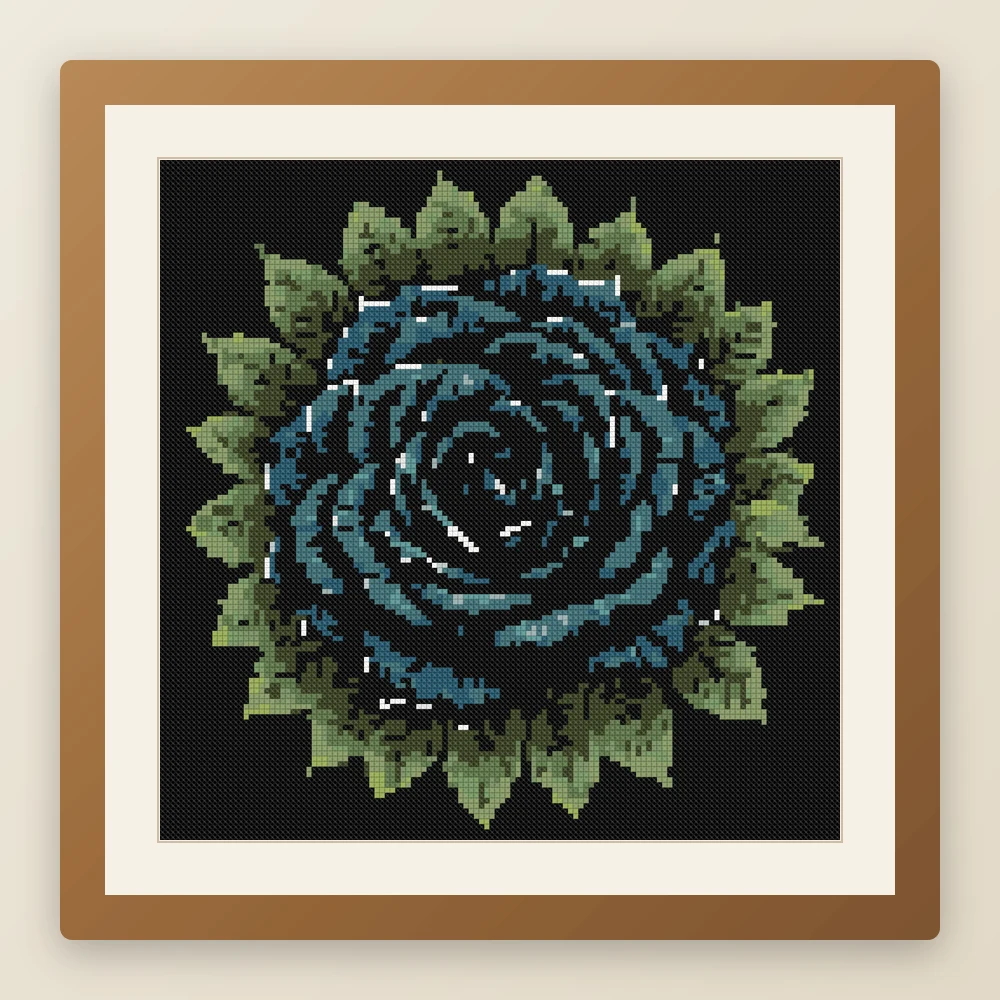 Black Rose Wreath cross stitch pattern, example of a finished piece