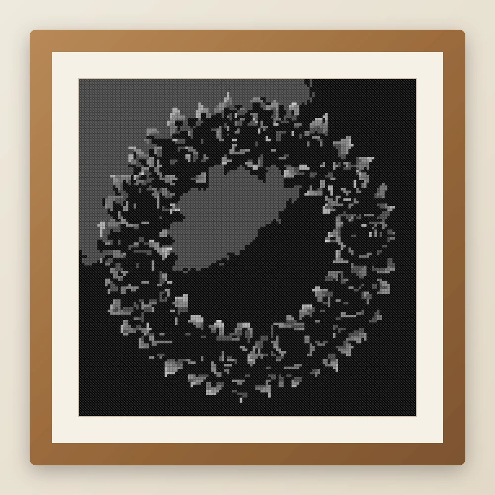 Black Rose Wreath cross stitch pattern, example of a finished piece