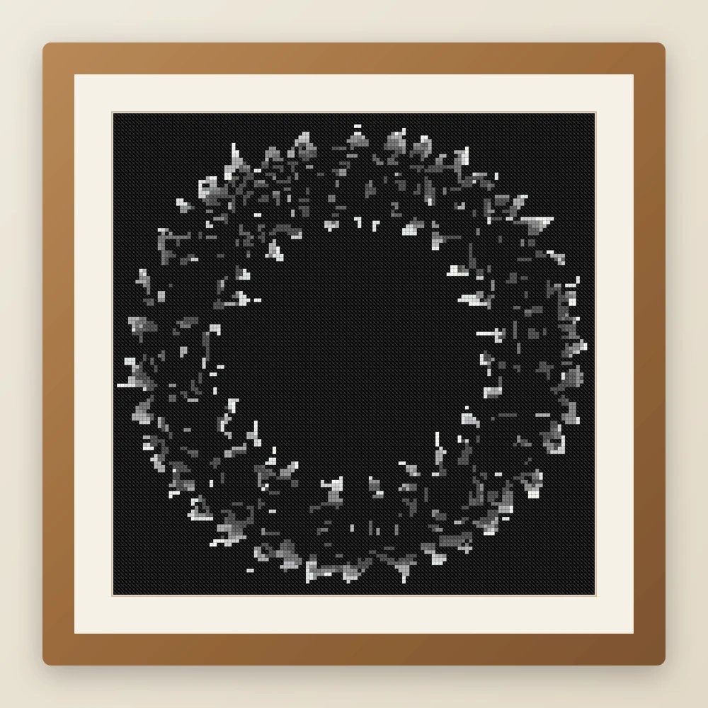 Black Rose Wreath cross stitch pattern, example of a finished piece