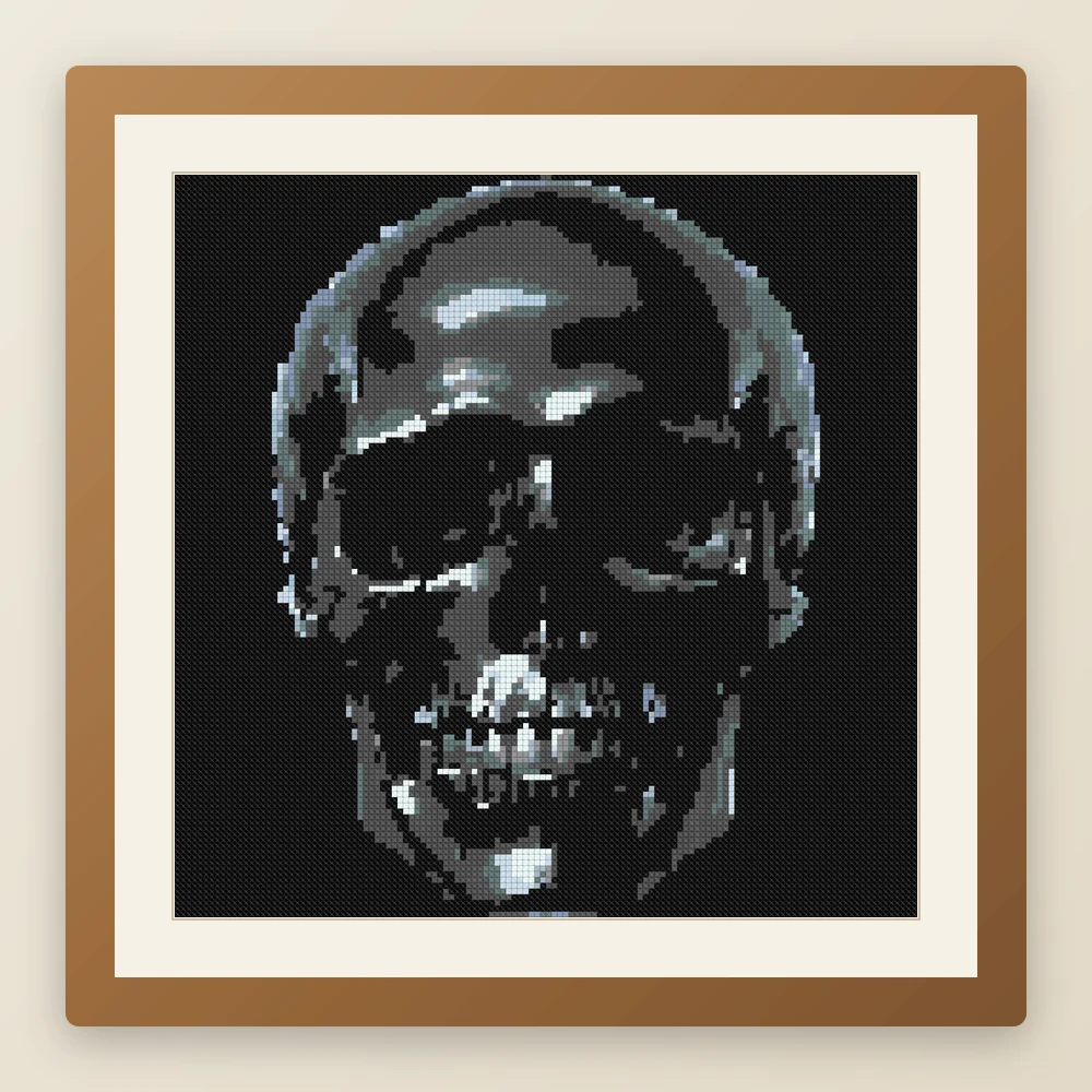 Crystal Skull cross stitch pattern, example of a finished piece