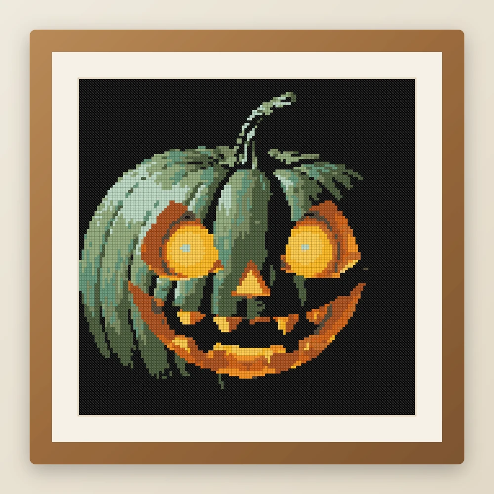 Pumpkin Phantom cross stitch pattern, example of a finished piece