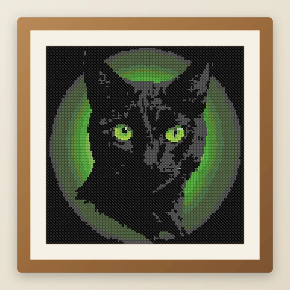 Witch's Cat cross stitch pattern, example of a finished piece